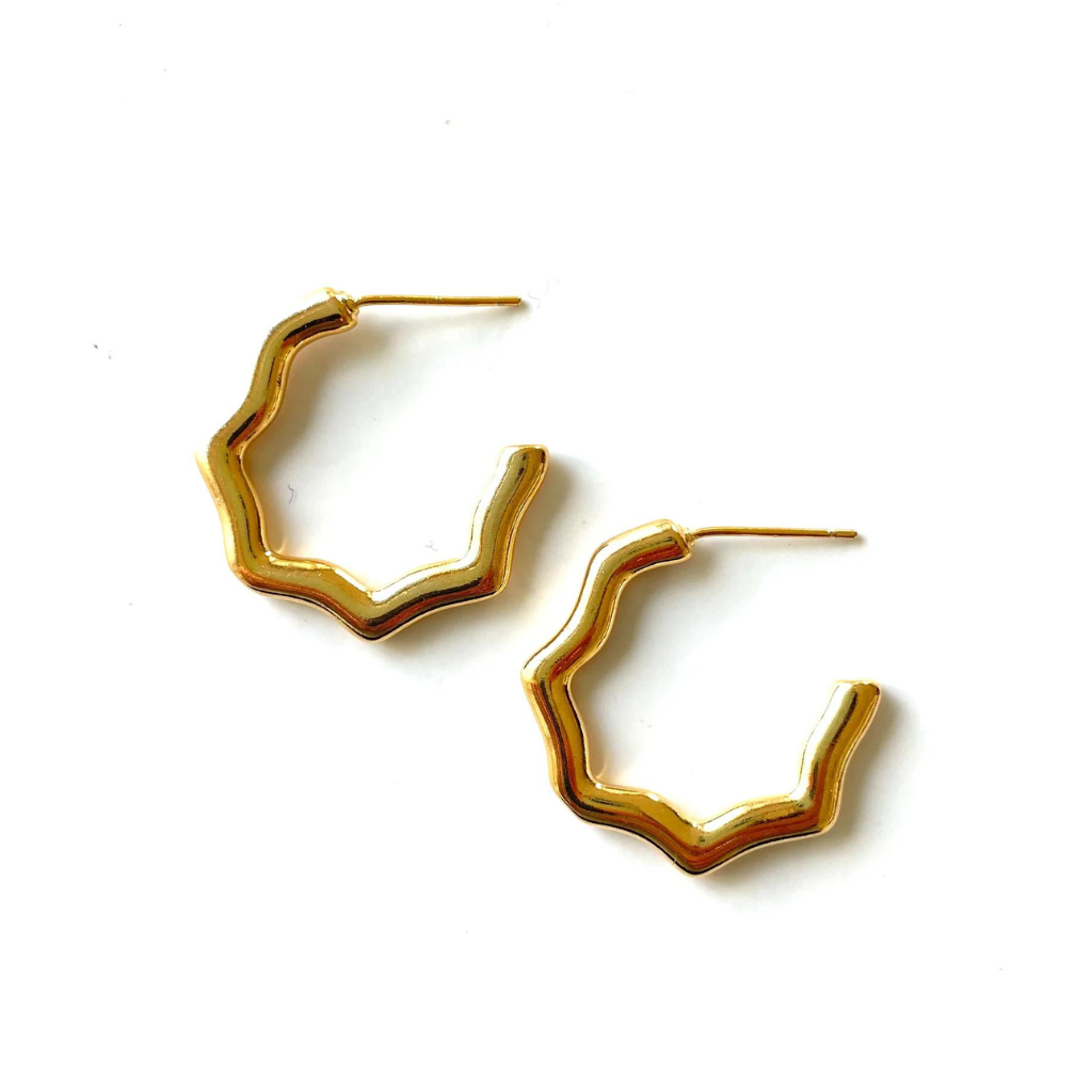 medium sized gold hoop earrings with a sleek finish and wavy design