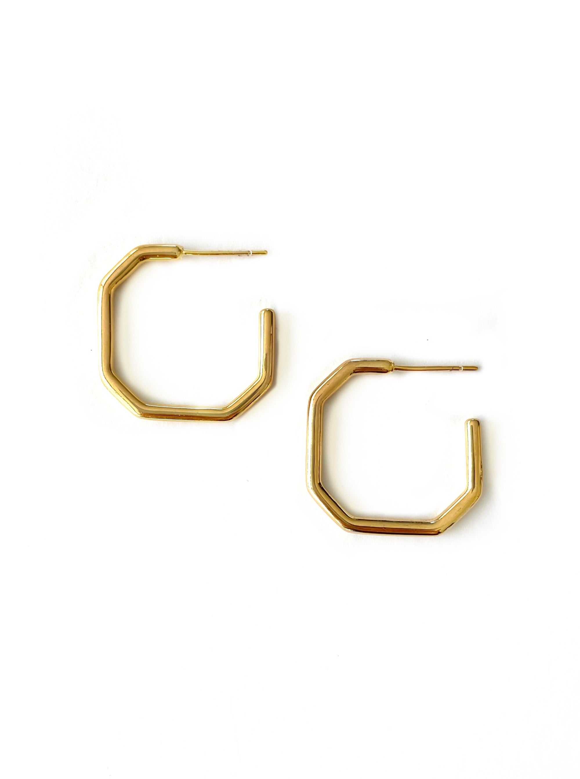 small gold plated half hoop earrings in an octagonal geometric shape  