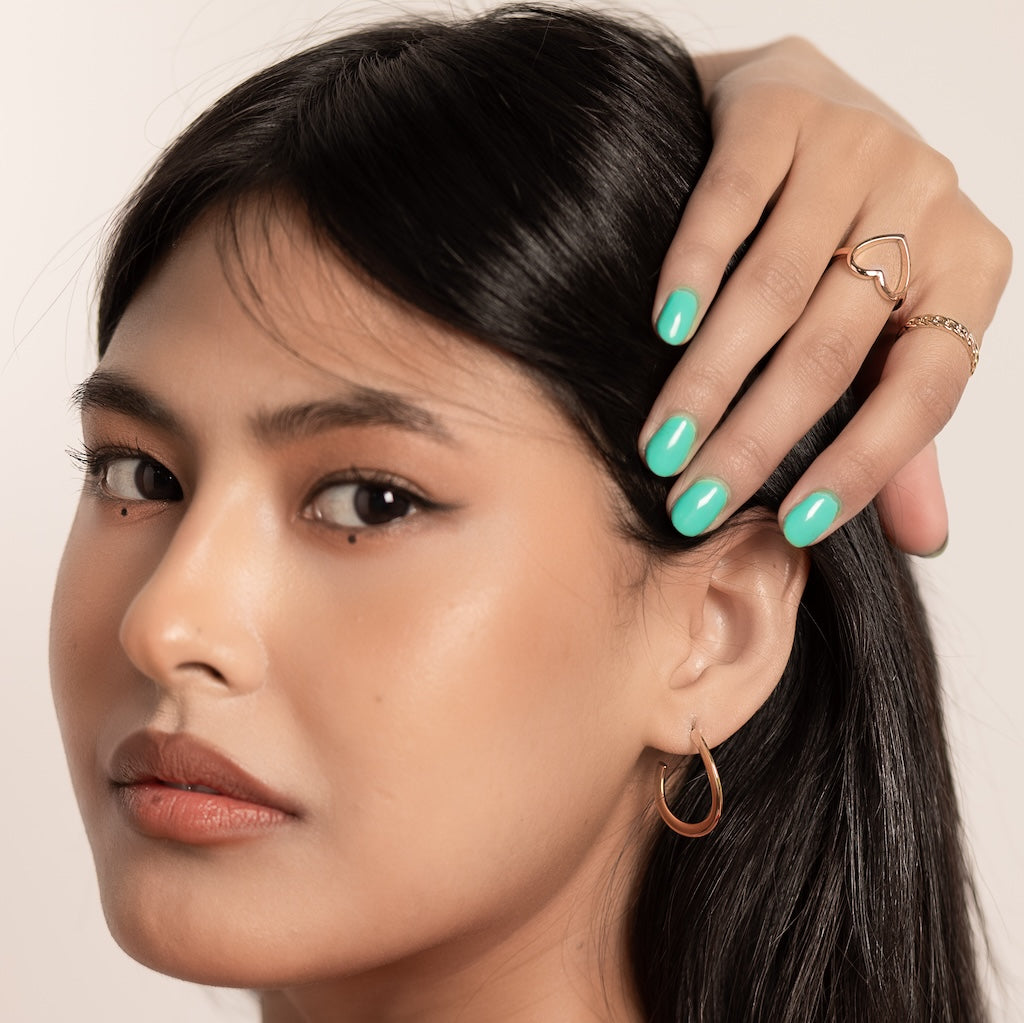 medium timeless semi hoop earrings with a sleek gold finish