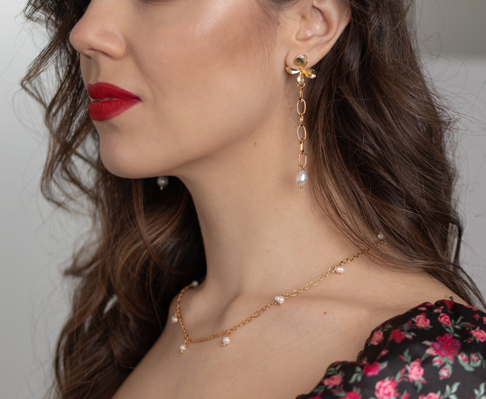 3 inch link chain drop earrings with freshwater pearls and a gold plated flower design