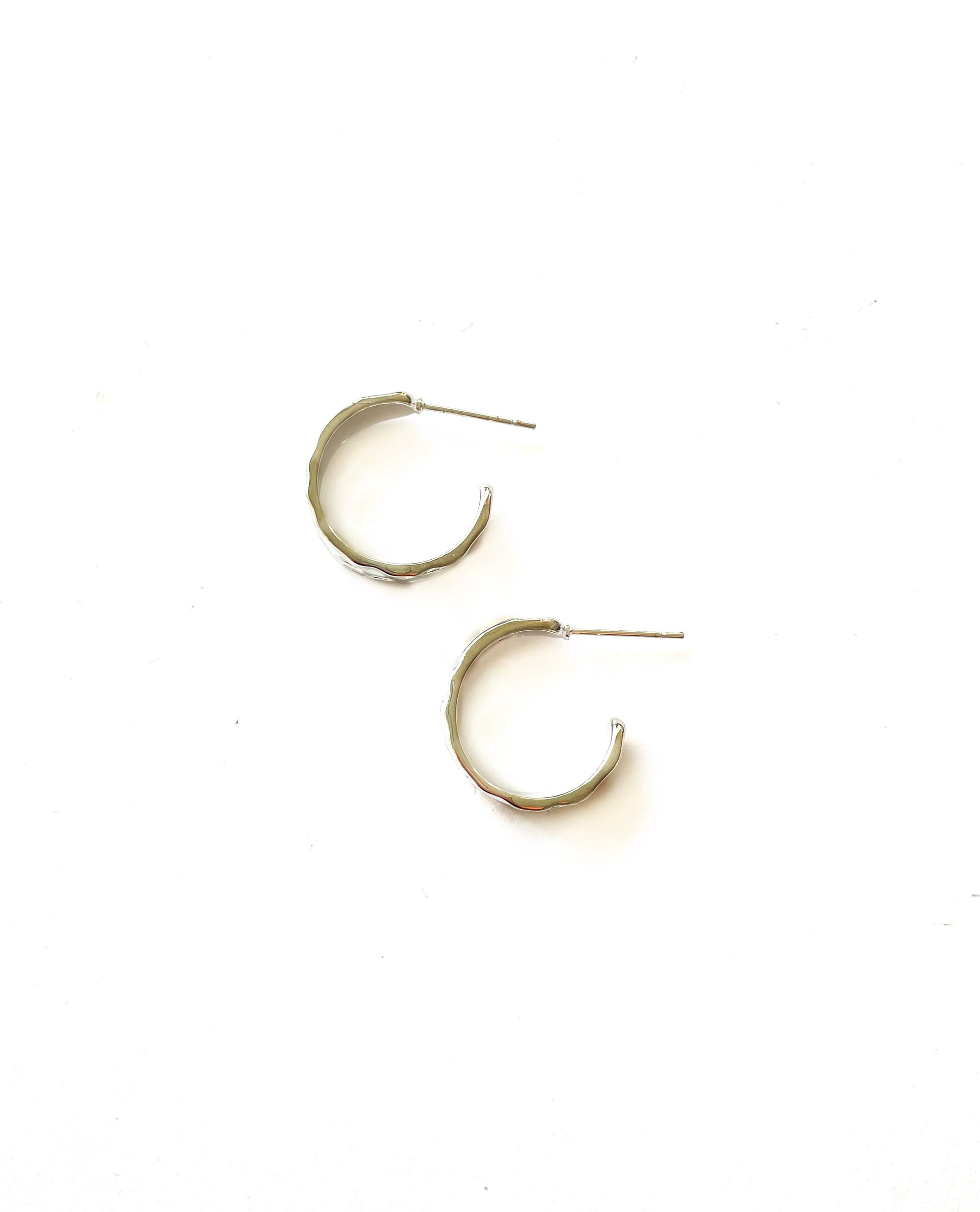 hammered silver hoop earrings with rhodium plating over italian brass