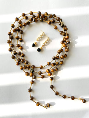 tiger eye gemstone earrings with a 2 inch thick drop chain and a matching long beaded necklace 