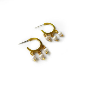 small semi hoop earrings in gold featuring a freshwater pearl drop down design
