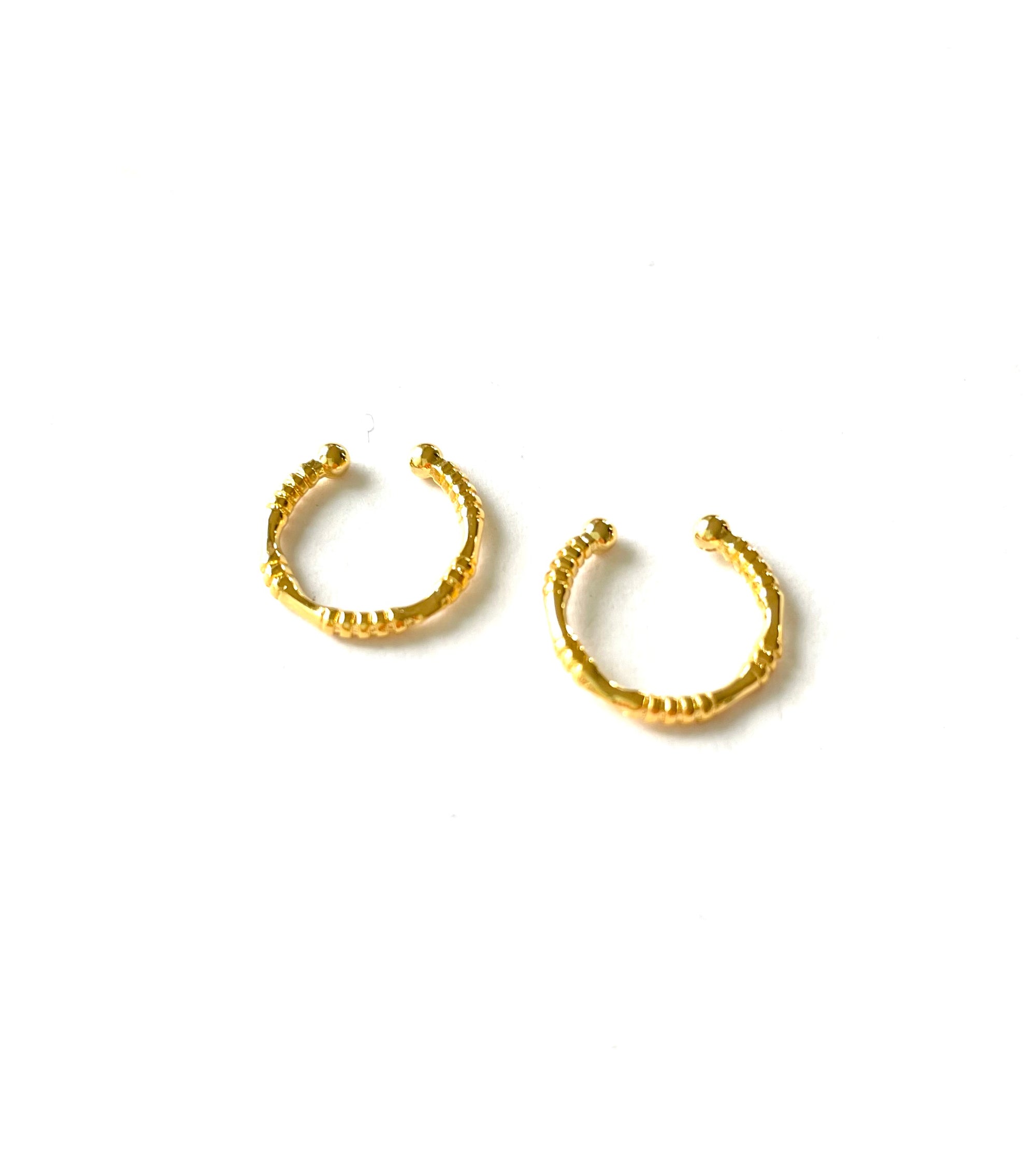 small and dainty ear cuff for pierced and non pierced ears with a gold finish over brass
