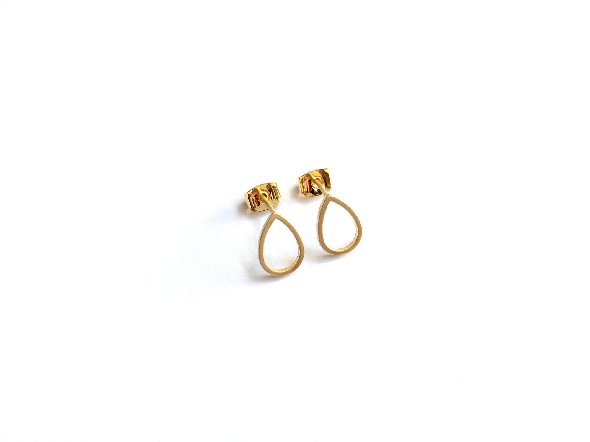 gold plated tiny and dainty open teardrop stud earrings in a pear shape 