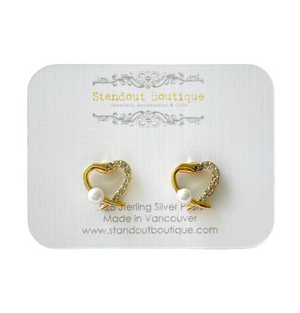 heart shaped stud earrings in gold with diamonds and pearls
